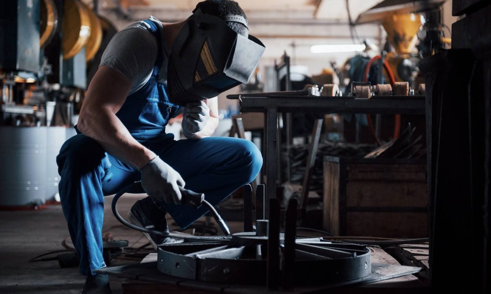 portrait-of-a-young-worker-at-a-large-metalworking-plant-the-welder-engineer-works-in-a-protective-1.jpg portrait-of-a-young-worker-at-a-large-metalworking-plant-the-welder-engineer-works-in-a-protective-1.jpg